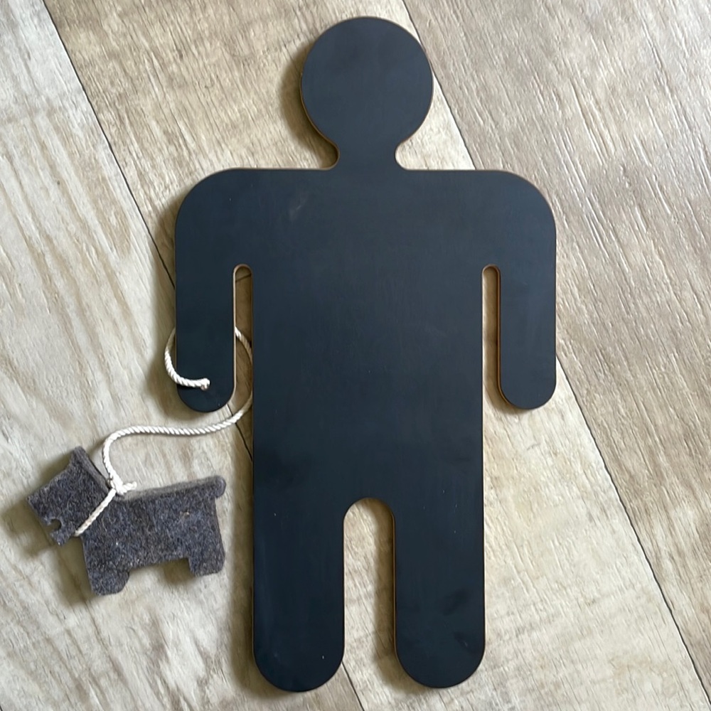 People chalkboards with dog erasers